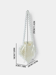 Handmade heart shaped pearl handbag with satin lining and dimensions displayed