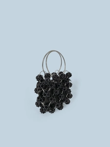 Handmade black beaded handbag with metallic rings and satin drawstring pouch