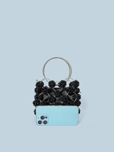 Handmade black beaded handbag with metallic silver rings and satin interior lining