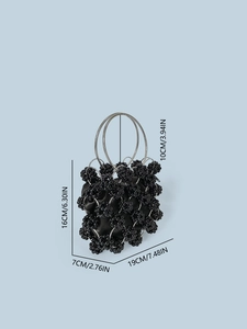 Handmade black beaded tote bag with silver metal rings and floral pearl clusters
