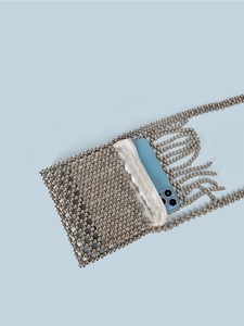 Handmade silver beaded crossbody bag with metallic beads and elegant fringe tassels