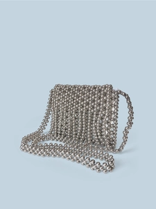Modern shiny silver handmade beaded crossbody bag with a long shoulder strap and tassel
