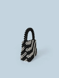 Handmade beaded bucket bag with black and silver stripes for evening parties