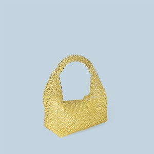 Detailed view of yellow crystal acrylic beaded handmade tote bag with a woven handle