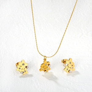 Parure de bijoux en acier doré avec pendentif fleur, boucles d'oreilles et cristaux