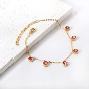18K gold plated anklet featuring six round pink crystal charms on a slim adjustable chain