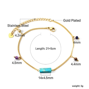 Detail view of colorful beads and rectangular gemstone on a gold-plated stainless steel anklet