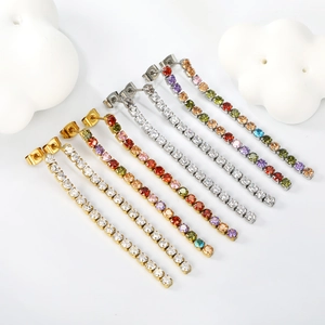 Long tassel drop earrings with sparkling colorful zircons on gold and silver bases