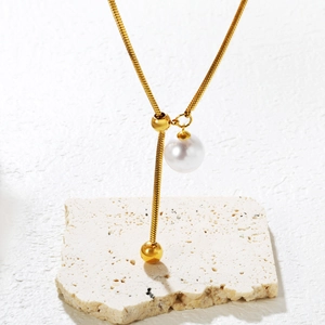 Minimalist Y-shaped golden snake chain necklace with pearl pendant and golden beads