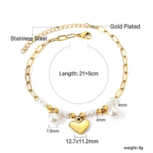 Macro shot of 21+5cm gold-plated starfish anklet with pearl and heart pendant specs