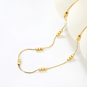 Minimalist 18K gold stainless steel snake chain necklace with square cube beads on white