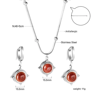 Vue détaillée du coffret bijoux en pierre de soleil avec mesures collier et boucles