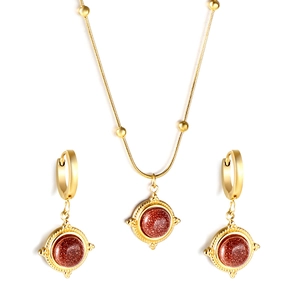 Parure rétro en acier doré avec pendentif en grès rouge et boucles d'oreilles
