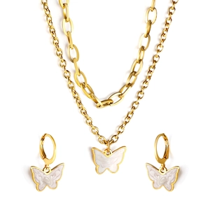 Golden double chain necklace and hoop earrings set with white shell butterfly pendants