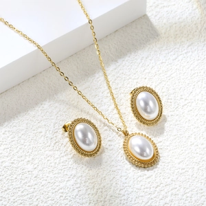 Golden stainless steel jewelry set with oval cat eye stone and vintage beaded border