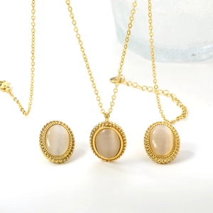 Minimalist stainless steel necklace set featuring oval cat-eye stone pendants in gold