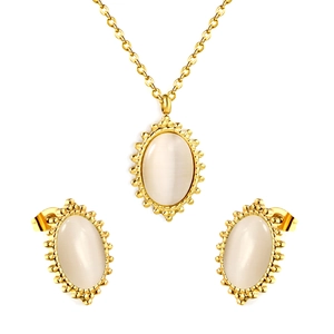Vintage French gold jewelry set with oval cat's eye stones and granulated bead borders