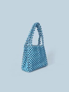 Handmade light blue beaded handbag with vintage woven design and crystal-like texture