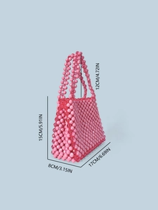 Handmade pink beaded handbag for women featuring a retro woven design and top handle