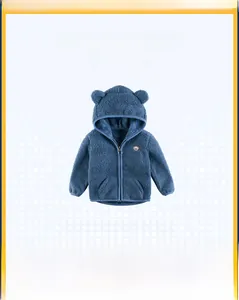 Detail of navy fleece hooded jacket for kids featuring bear ears and cute chest embroidery