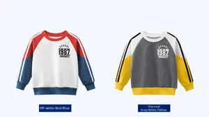 Detail of color-block kids sweatshirts in off-white red blue and charcoal yellow combinations