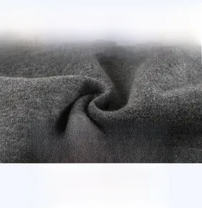 Detail of soft breathable dark gray knit fabric for children's sweatshirt inner lining