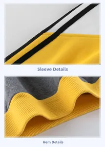 Detailed view of color-block sleeves and elastic ribbed hem on kids sweatshirt