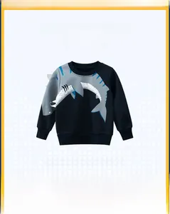 Detailed view of kids navy shark sweatshirt with ribbed cuffs and round neck