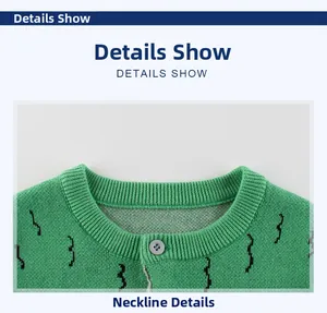 Detail of green knit sweater neckline with ribbing and single button for boys