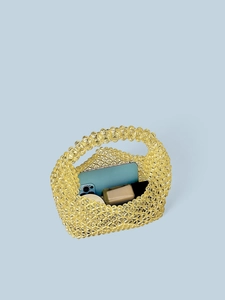 Handmade yellow beaded tote bag with a clear grid structure and spacious interior