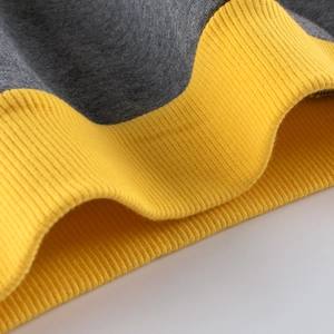 Gray fleece kids sweatshirt with bright yellow ribbed cuffs for autumn and winter