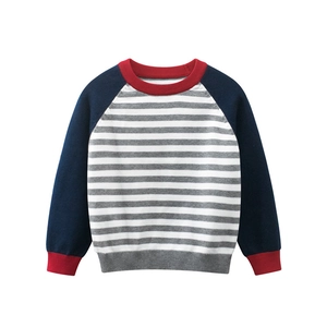 Striped kids crewneck sweater with raglan sleeves and vibrant red ribbed cuffs