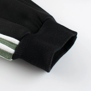 Pantalon de sport garçon en polaire avec poignets rayés et tissu en coton de qualité