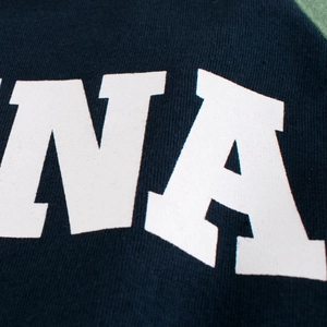 Boys long sleeve navy and green contrast t-shirt with large white letter print design