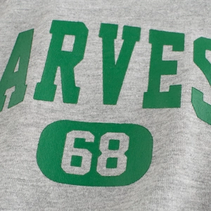 Classic heather gray knit boys t-shirt with green Harves 68 vintage sports print
