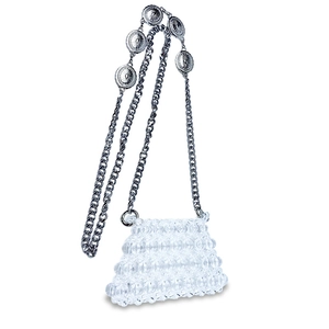 Detail view of mini beaded bag with transparent acrylic pearls and silver metal chain
