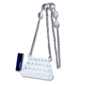 Detail of handmade beaded mini bag with silver chain and coins for lipstick storage