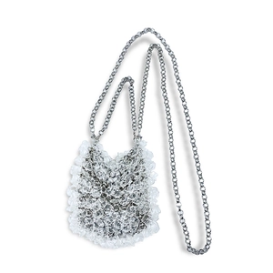 Detail of acrylic bead bag with translucent wavy textures and silver metal chain