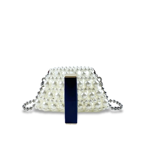 Detail of handmade pearl mini bag with silver ball chain and lipstick size comparison