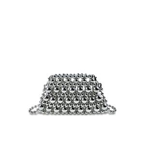 Detailed view of silver metallic bead weave bag with pearl chain and glossy finish
