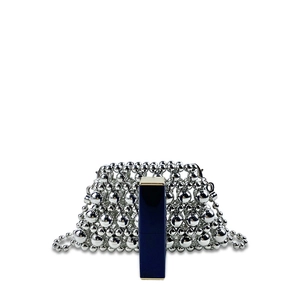 Close-up of mini silver beaded bag with a lipstick inside for size reference