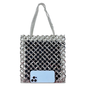 Detailed view of silver sequin beaded tote bag showing hand-woven texture and large size