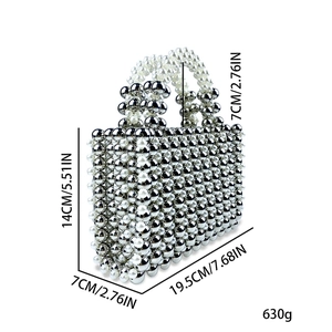 Detailed size specifications for beaded evening bag: 19.5x14x7cm with 7cm handle height