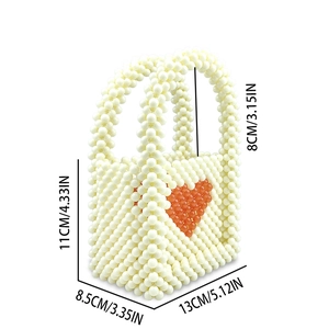 Size chart for mini handmade pearl handbag with heart pattern and dimensions