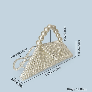 Detailed view of handmade triangular pearl handbag with long shoulder strap and handle