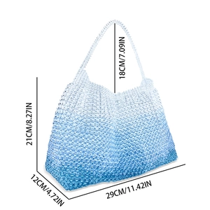 Detailed view of the handmade beaded tote bag dimensions and ocean blue gradient texture