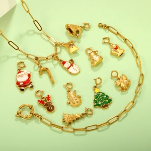 Christmas jewelry set with gold paperclip chain and 11 festive enamel holiday pendants