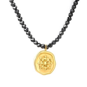 Elegant gold spider web pendant necklace with black multifaceted beaded chain for Halloween