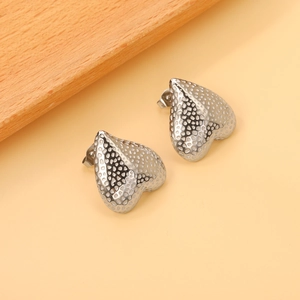 Inverted heart stud earrings in silver with unique hammered honeycomb metal texture