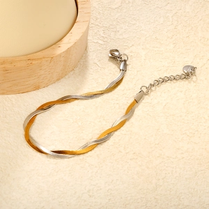 Hip-hop style dual-tone gold and silver twisted blade chain bracelet in stainless steel